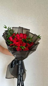 Red cascade - red roses and Italian ruscus.