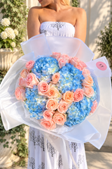 Marshmallow – Peach Roses & Blue Hydrangea Bouquet by Fashion Flowers