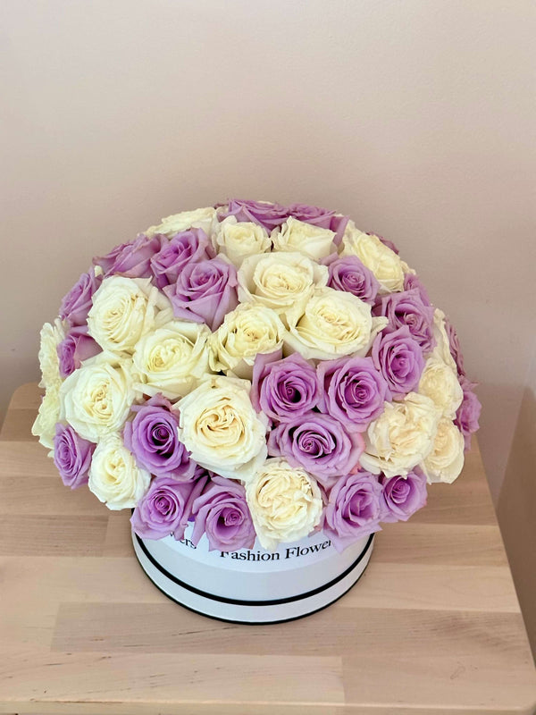 Blueberry ice cream - mix of white and purple roses.