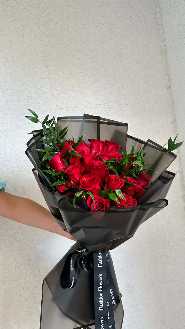Red cascade - red roses and Italian ruscus.